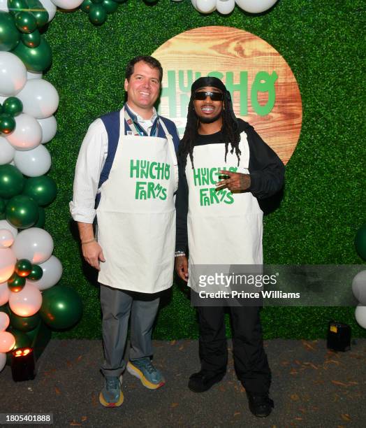 Jeremy Lewis and Quavo attend "Huncho Farms" hosted by Quavo Cares & Urban Recipe in Atlanta Community ahead of Thanksgiving on November 20, 2023 in...