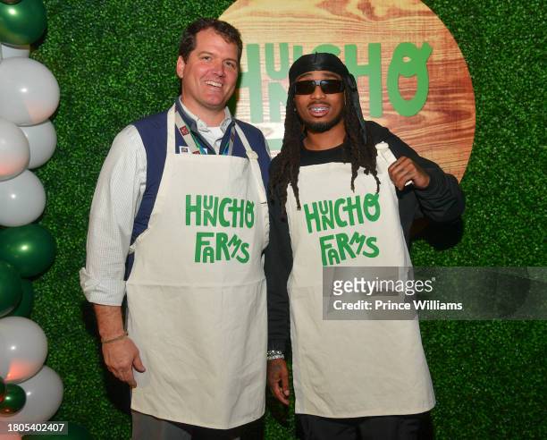 Jeremy Lewis and Quavo attend "Huncho Farms" hosted by Quavo Cares & Urban Recipe in Atlanta Community ahead of Thanksgiving on November 20, 2023 in...