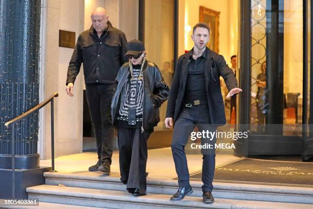 Madonna is seen leaving the Palazzo Parigi hotel in on November 25, 2023 in Milan, Italy.