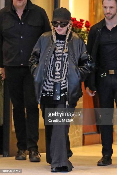 Madonna is seen leaving the Palazzo Parigi hotel in on November 25, 2023 in Milan, Italy.