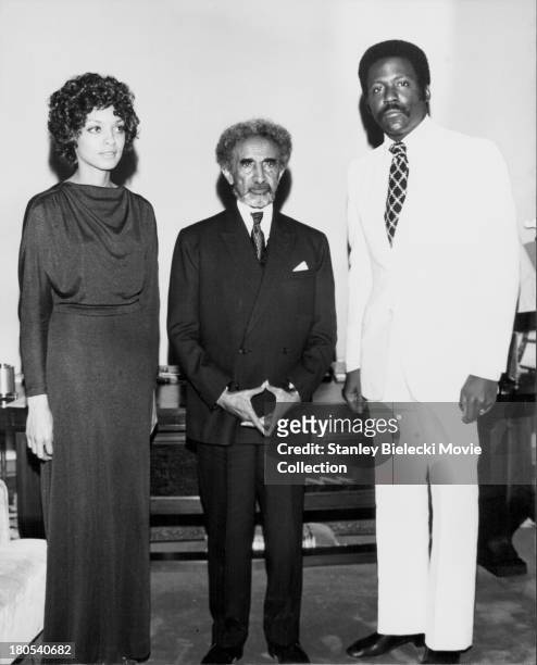 Actor Richard Roundtree and Vonetta McGee being received by Ethiopian Emperor Haile Selassie, to promote the movie 'Shaft in Africa', 1973.