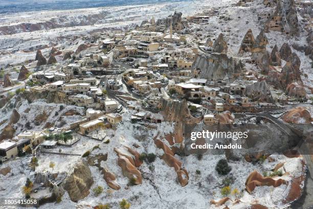 An aerial view of the snow covered fairy chimneys after snowfall in Cappadocia, which is preserved as a UNESCO World Heritage site and is famous for...