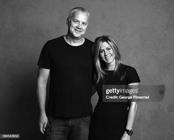 Actor Tim Robbins and actress/producer Jennifer Aniston of 'Life of Crime' pose at the Guess Portrait Studio during 2013 Toronto International Film...