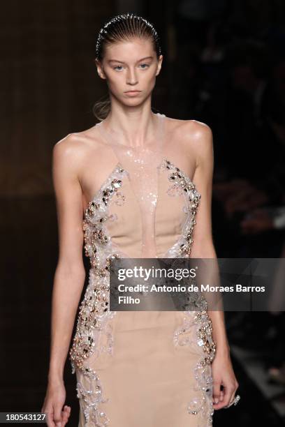 Model walks the runway at the Julien Macdonald show during London Fashion Week SS14 at on September 14, 2013 in London, England.