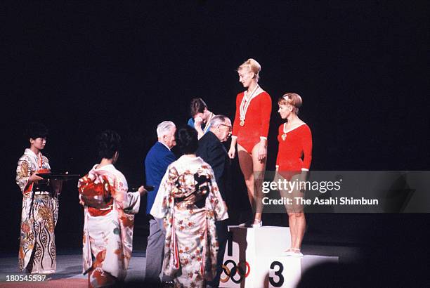 Gold Medalist Polina Astakhova of Soviet Union, Silver Medalist Katalin Makray-Schmitt of Hungary and Bronze Medalist Larysa Latynina of Soviet Union...