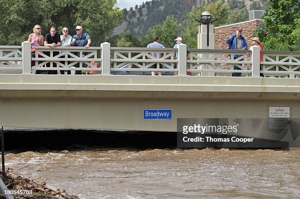 Boulder residents look over Boulder Canyon flooded due to heavy rains and swollen rivers on September 13, 2013 in Boulder, Colorado. The historic...
