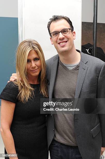 Jennifer Aniston and Daniel Schechter pose at the Guess Portrait Studio on day 9 of the 2013 Toronto International Film Festival at Bell Lightbox on...