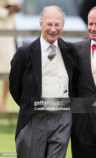 Robert Fellowes attends the wedding of James Meade and Lady Laura Marsham at The Parish Church of St. Nicholas in Gayton on September 14, 2013 in...