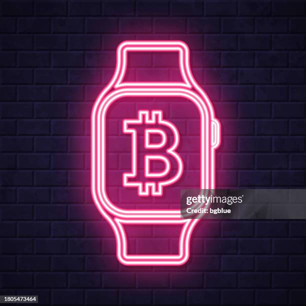 smartwatch with bitcoin sign. glowing neon icon on brick wall background - clock on wall stock illustrations