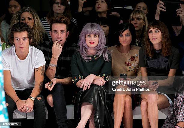 Harry Styles, Nick Grimshaw, Kelly Osbourne, Leigh Lezark and Alexa Chung attends the House Of Holland show during London Fashion Week SS14 on...