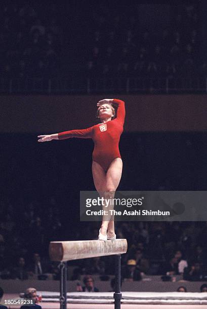 Vera Caslavska of Czechoslovakia competes in the Balance Beam of the Women's Artistic Gymnastics Individual All-Around during the Tokyo Olympics at...