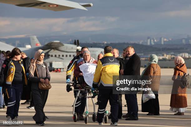 Palestinian cancer patients are transferred from Gaza to be treated in Turkey on November 20, 2023 in Ankara, Turkey. 61 patients and 49 accompanying...