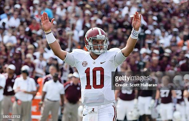 McCarron of the Alabama Crimson Tide celebrates a second quarter touchdown during the game against the Texas A&M Aggies at Kyle Field on September...
