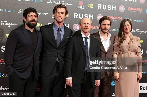 Actors Pierfrancesco Favino, Chris Hemsworth, director Ron Howard, actor Daniel Bruhl and actress Alexandra Maria Lara attend the 'Rush' premiere at...