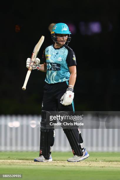 Amelia Kerr of the Heat celebrate 50 runs during the WBBL match between Brisbane Heat and Sydney Sixers at Allan Border Field, on November 21 in...