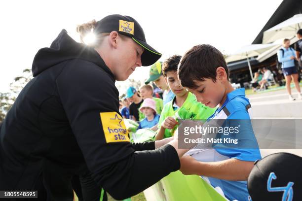 Heather Knight of the Thunder interacts with young fans after the WBBL match between Sydney Thunder and Adelaide Strikers at Cricket Central, on...
