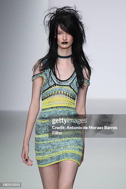 Model walks the runway at the Mark Fast show during London Fashion Week SS14 at BFC Courtyard Showspace on September 14, 2013 in London, England.