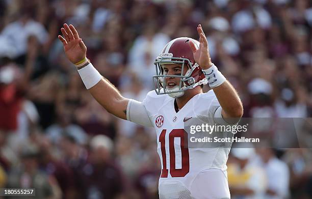 McCarron of the Alabama Crimson Tide celebrates a third quarter touchdown during the game against the Texas A&M Aggies at Kyle Field on September 14,...