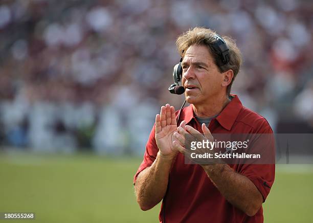 Head Coach Nick Saban of the Alabama Crimson Tide celebrates after a third quarter touchdown during the game against the Texas A&M Aggies at Kyle...