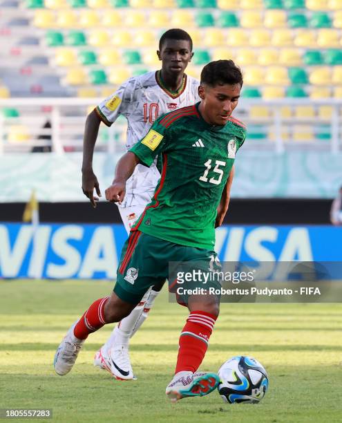 Luis Ortiz of Mexico runs with the ball during the FIFA U-17 World Cup Round of 16 match between Mali and Mexico at Gelora Bung Tomo Stadium on...