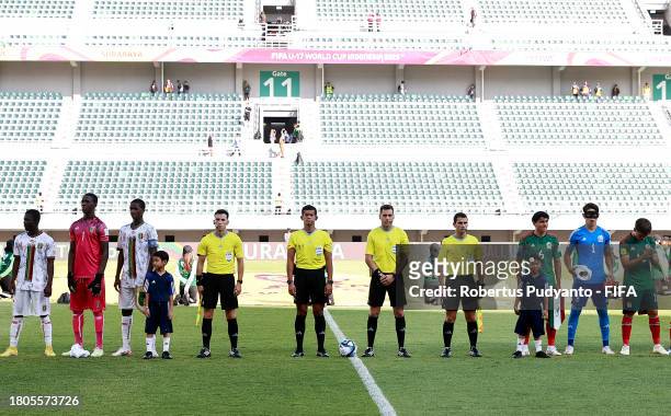 Referee Gustavo Tejera and Assistant Referees Carlos Barreiro, Ivo Nigel Mendez Chavez and Andres Nievas line up prior to the FIFA U-17 World Cup...