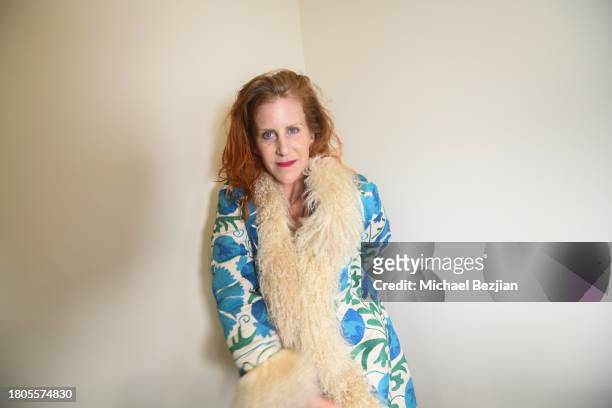 Alix Gucovsky poses for portrait at A Plant Based Friendsgiving Celebration at the Home of Rainbeau Mars on November 20, 2023 in Venice, California.