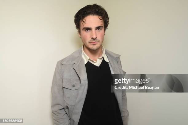 Cade Guillory poses for portrait at A Plant Based Friendsgiving Celebration at the Home of Rainbeau Mars on November 20, 2023 in Venice, California.