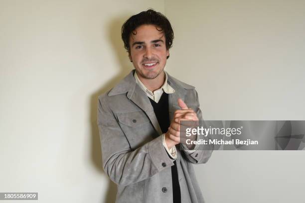 Cade Guillory poses for portrait at A Plant Based Friendsgiving Celebration at the Home of Rainbeau Mars on November 20, 2023 in Venice, California.
