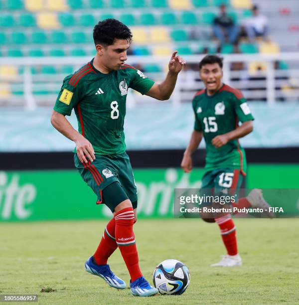 Jose Urias of Mexico passes the ball during the FIFA U-17 World Cup Round of 16 match between Mali and Mexico at Gelora Bung Tomo Stadium on November...