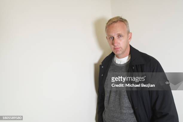 Mark Payne poses for portrait at A Plant Based Friendsgiving Celebration at the Home of Rainbeau Mars on November 20, 2023 in Venice, California.