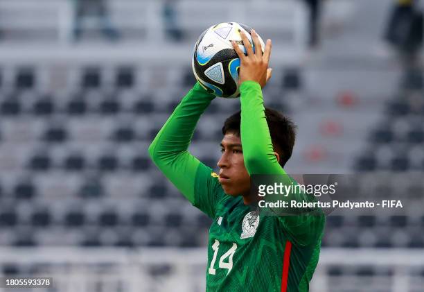 Manuel Sanchez of Mexico takes a throw-in during the FIFA U-17 World Cup Round of 16 match between Mali and Mexico at Gelora Bung Tomo Stadium on...