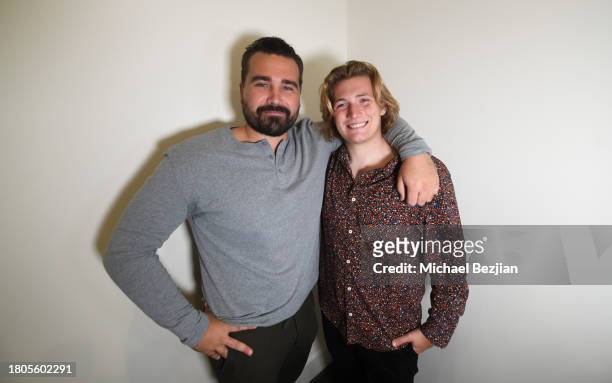 Jackson Marcum and Emerson Langlois-Ulrich pose for portrait at A Plant Based Friendsgiving Celebration at the Home of Rainbeau Mars on November 20,...