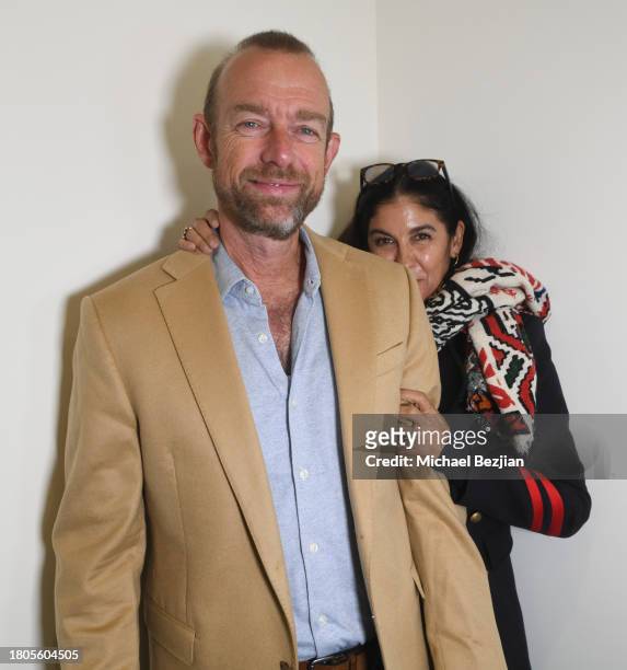 Eric Paquette and Jessica Postigo pose for portrait at A Plant Based Friendsgiving Celebration at the Home of Rainbeau Mars on November 20, 2023 in...