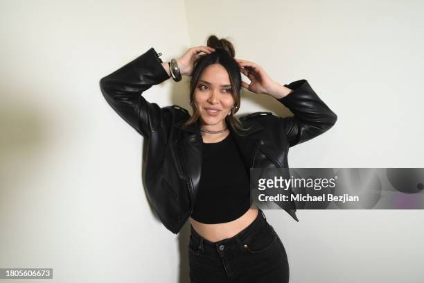 Cynthia Baires poses for portrait at A Plant Based Friendsgiving Celebration at the Home of Rainbeau Mars on November 20, 2023 in Venice, California.