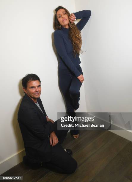 Rainbeau Mars and Matthew Kenney pose for portrait at A Plant Based Friendsgiving Celebration at the Home of Rainbeau Mars on November 20, 2023 in...