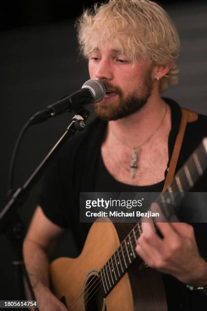 Chris Jobe performs on stage at A Plant Based Friendsgiving Celebration at the Home of Rainbeau Mars on November 20, 2023 in Venice, California.