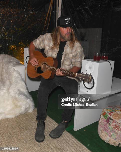 Crash Carsen performs at A Plant Based Friendsgiving Celebration at the Home of Rainbeau Mars on November 20, 2023 in Venice, California.