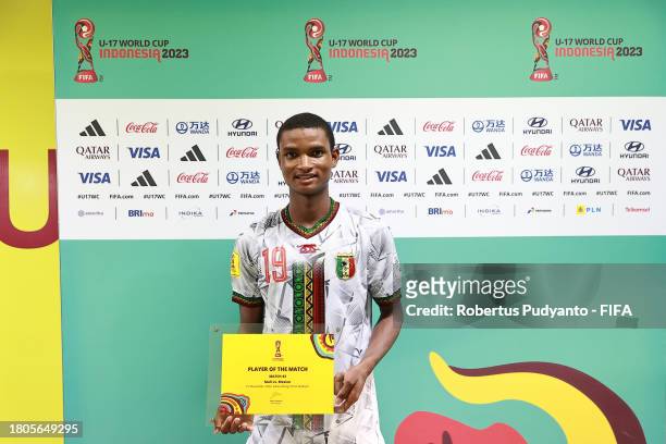 Mahamoud Barry of Mali poses for a photo with the Player Of The Match award after their sides victory in the FIFA U-17 World Cup Round of 16 match...
