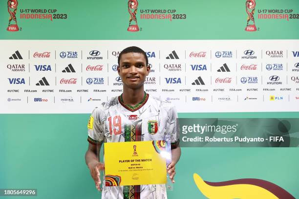 Mahamoud Barry of Mali poses for a photo with the Player Of The Match award after their sides victory in the FIFA U-17 World Cup Round of 16 match...