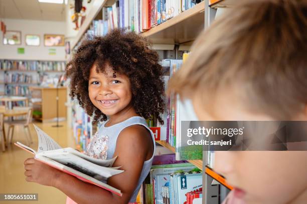 children visiting the library - public library stock pictures, royalty-free photos & images