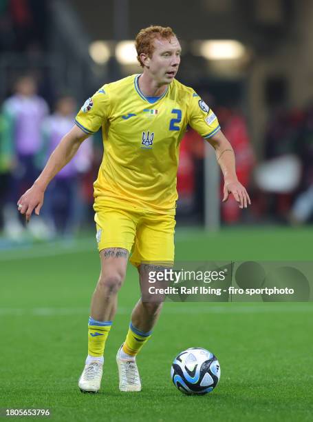 Yukhym Konoplia of Ukraine plays the ball during the UEFA EURO 2024 European qualifier match between Ukraine and Italy at BayArena on November 20,...