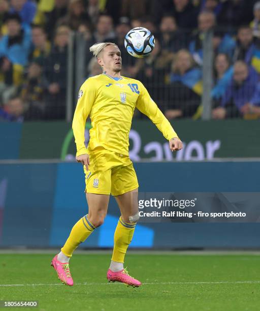 Mykhailo Mudryk of Ukraine plays the ball during the UEFA EURO 2024 European qualifier match between Ukraine and Italy at BayArena on November 20,...