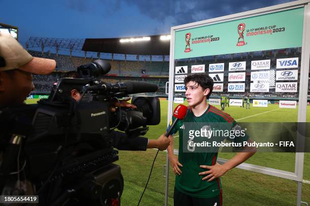 Isaac Martinez of Mexico is interviewed after the FIFA U-17 World Cup Round of 16 match between Mali and Mexico at Gelora Bung Tomo Stadium on...