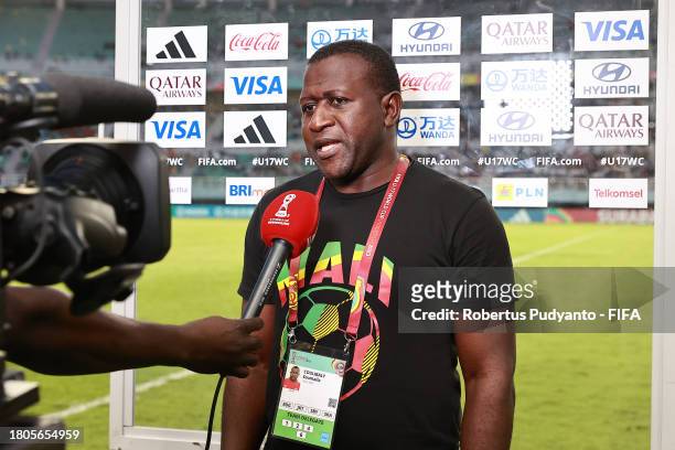 Soumaila Coulibaly, Head Coach of Mali, is interviewed after the FIFA U-17 World Cup Round of 16 match between Mali and Mexico at Gelora Bung Tomo...