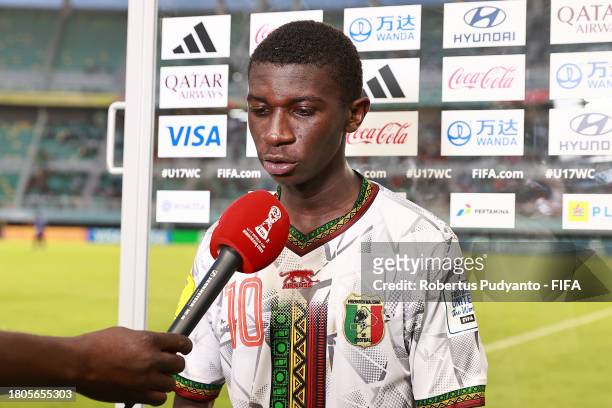 Ange Martial Tia of Mali is interviewed after the FIFA U-17 World Cup Round of 16 match between Mali and Mexico at Gelora Bung Tomo Stadium on...
