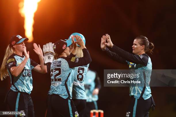 Jess Jonassen of the Heat celebrates a wicket during the WBBL match between Brisbane Heat and Sydney Sixers at Allan Border Field, on November 21 in...