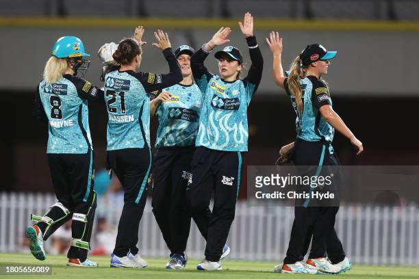 Amelia Kerr of the Heat celebrates a catch during the WBBL match between Brisbane Heat and Sydney Sixers at Allan Border Field, on November 21 in...