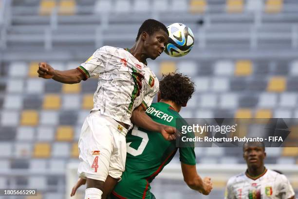 Souleymane Sanogo of Mali contends for the aerial ball with Javen Romero of Mexico during the FIFA U-17 World Cup Round of 16 match between Mali and...