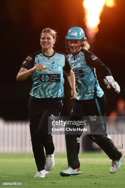 Georgia Voll of the Heat celebrates a wicket during the WBBL match between Brisbane Heat and Sydney Sixers at Allan Border Field, on November 21 in...