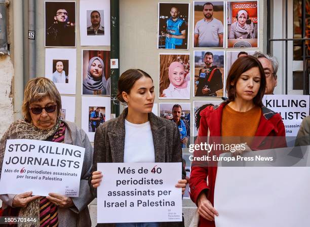 Several people with posters during a rally of the Unio de Periodistes Valencians in defense of press freedom and the right to information, on 21...